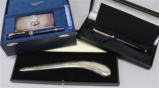 A Montblanc Noblesse Oblige fountain pen, a Theo Fennell writing set and paperknife and a Pringle leather-bound notebook, (4)